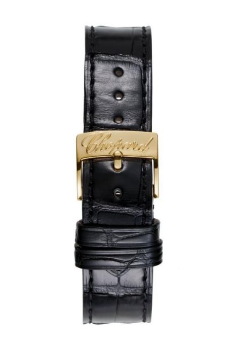 The 18k gold fake watches have black alligator leather straps.